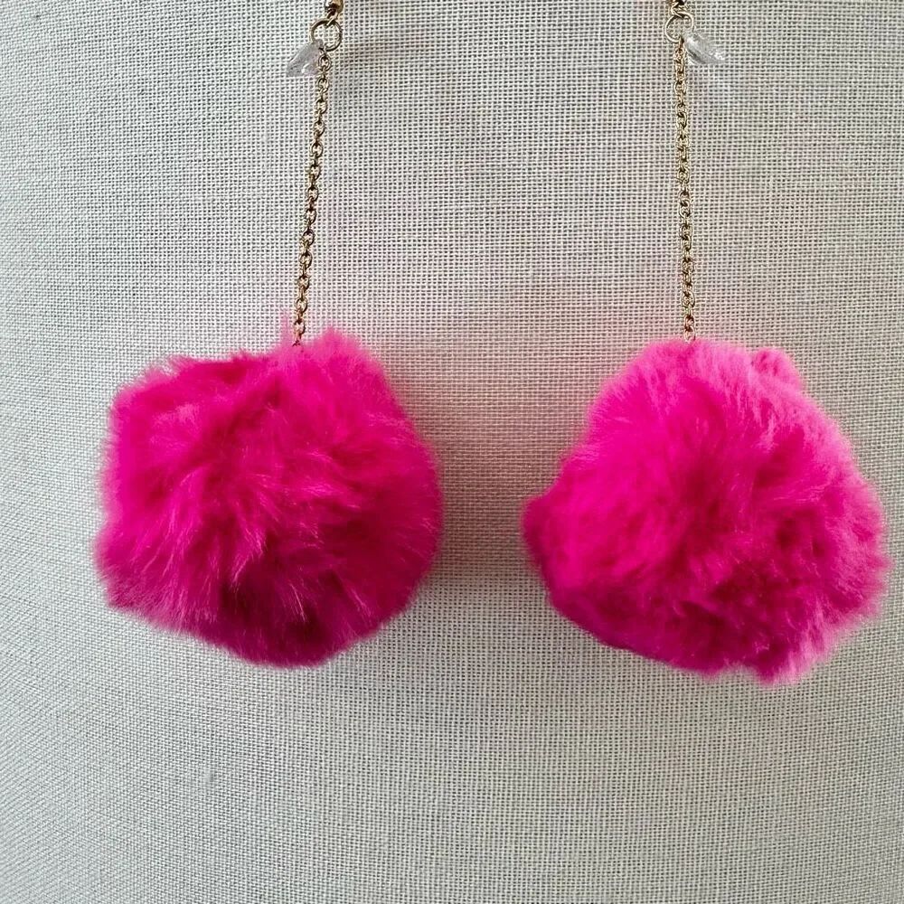 Gold tone pink pom pom earrings